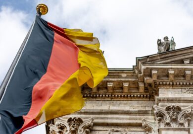 german-flag-waving-in-front-of-the-building-in-mun-2022-11-14-05-19-37-utc_Easy-Resize.com_